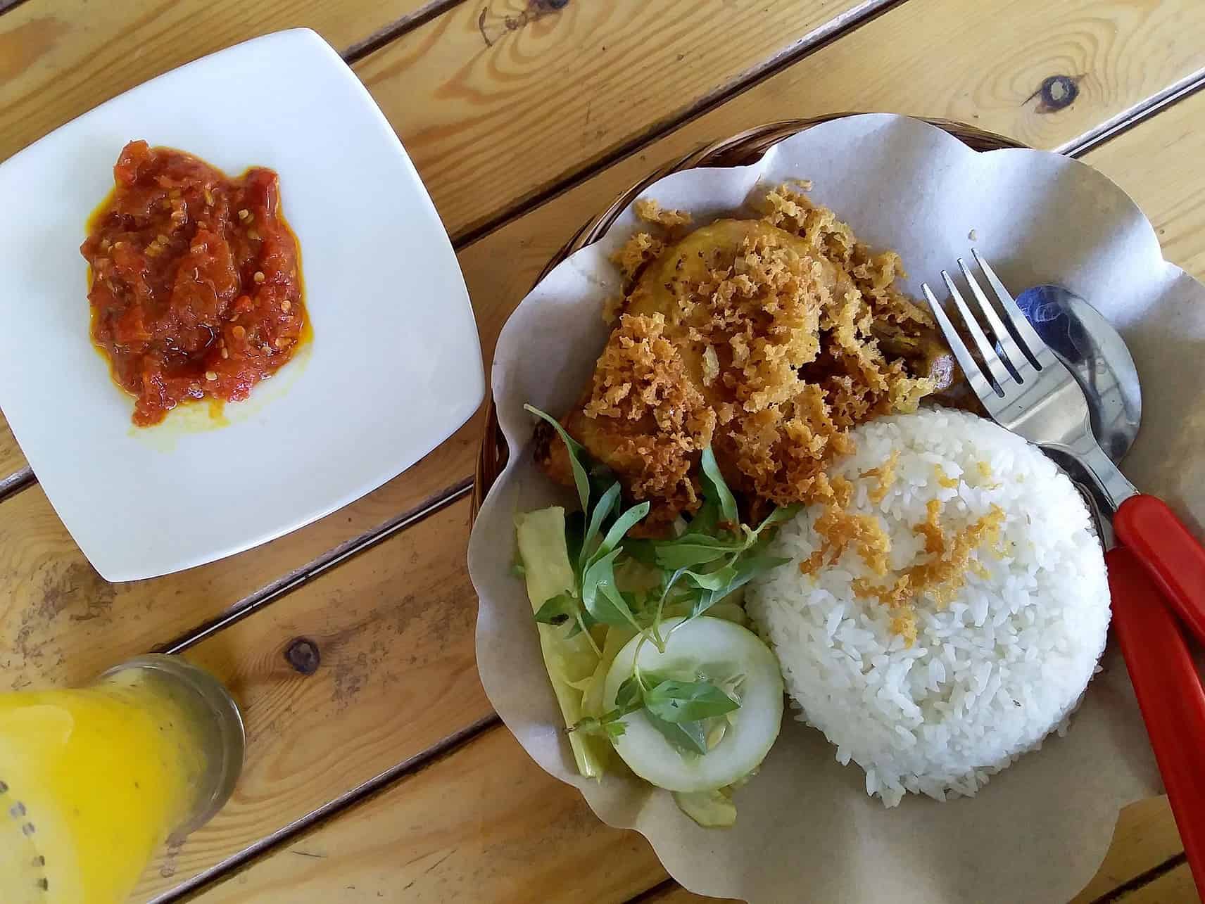 Marinated chicken dish Ayam Goreng in Indonesia.