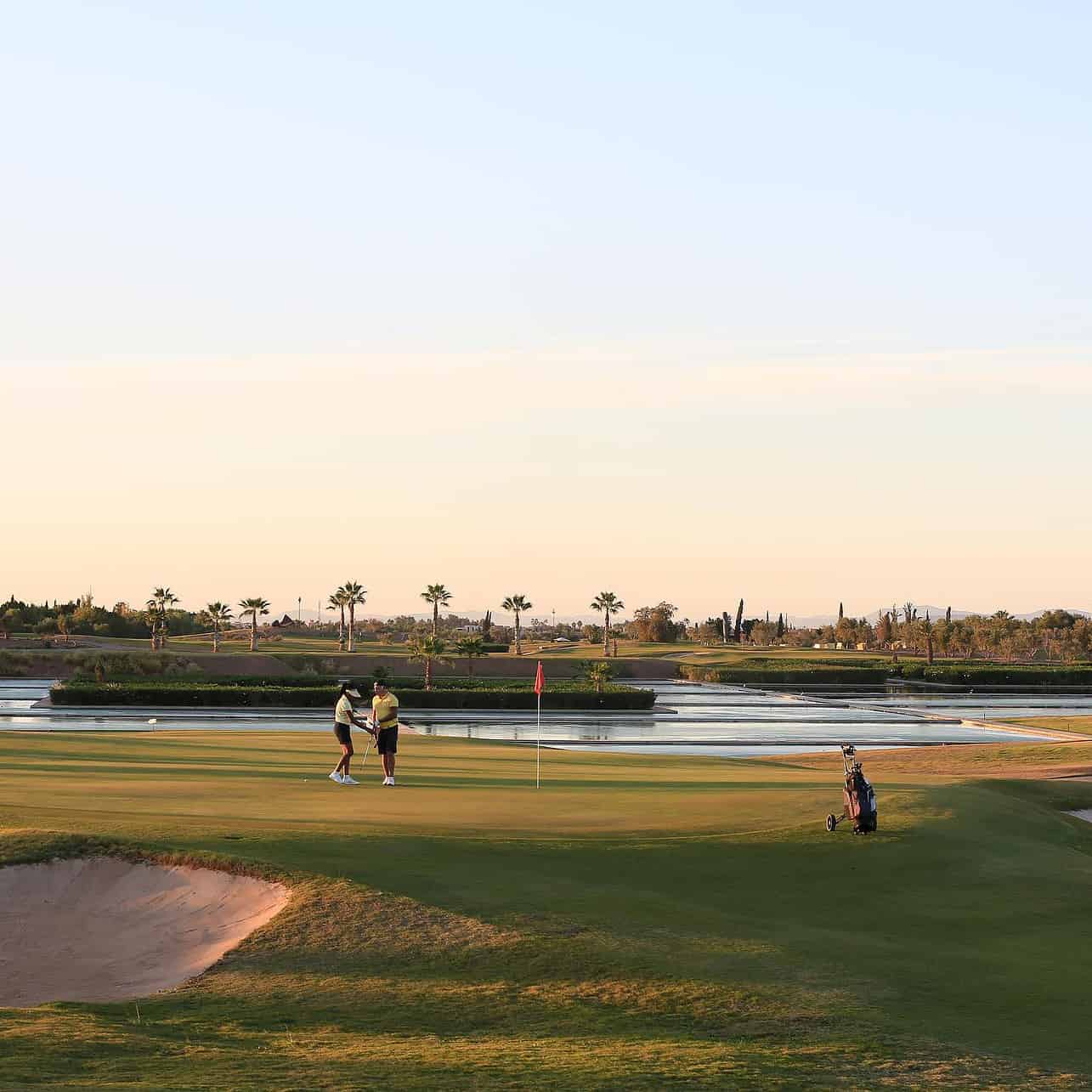End of the day on the green of the 17th hole at the Al Maaden Golf Marrakech in Morocco.