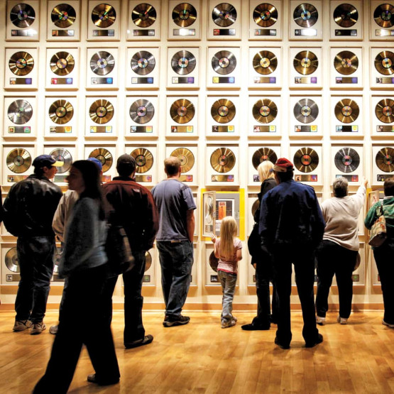 Wall with golden records at the Country Music Hall of Fame in Nashville, USA.