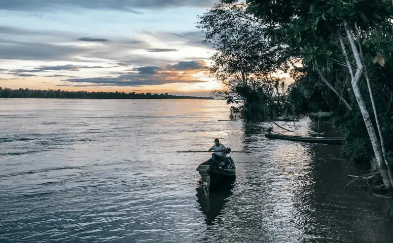 local in boat on amazon river