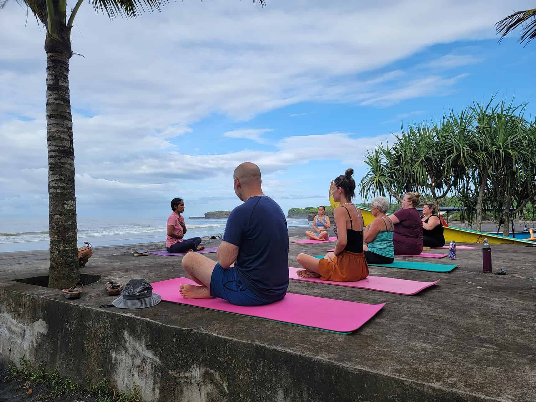Yoga with sea view at the Bali Green Retreat in the Hindu village Sesandan in Megati district, Tabanan Regency, Bali, Indonesia.