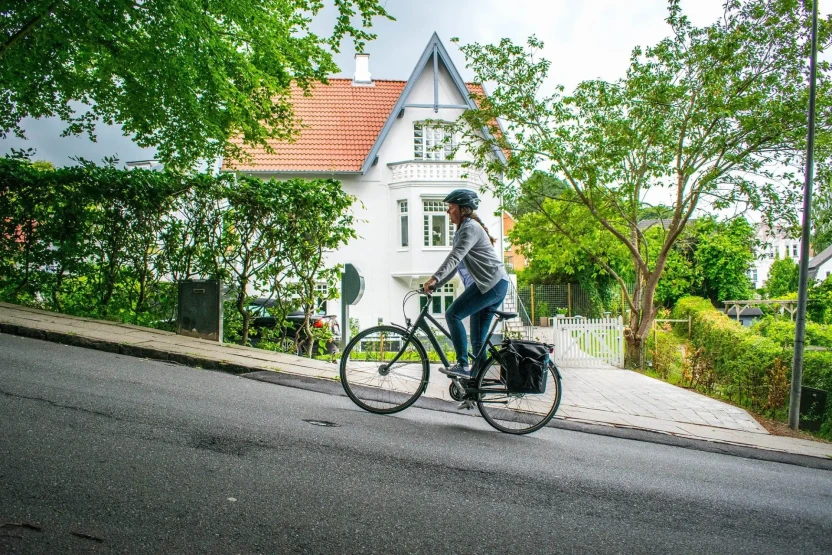 Biking a steep hill in Vejle, Hærvejen, Denmark.